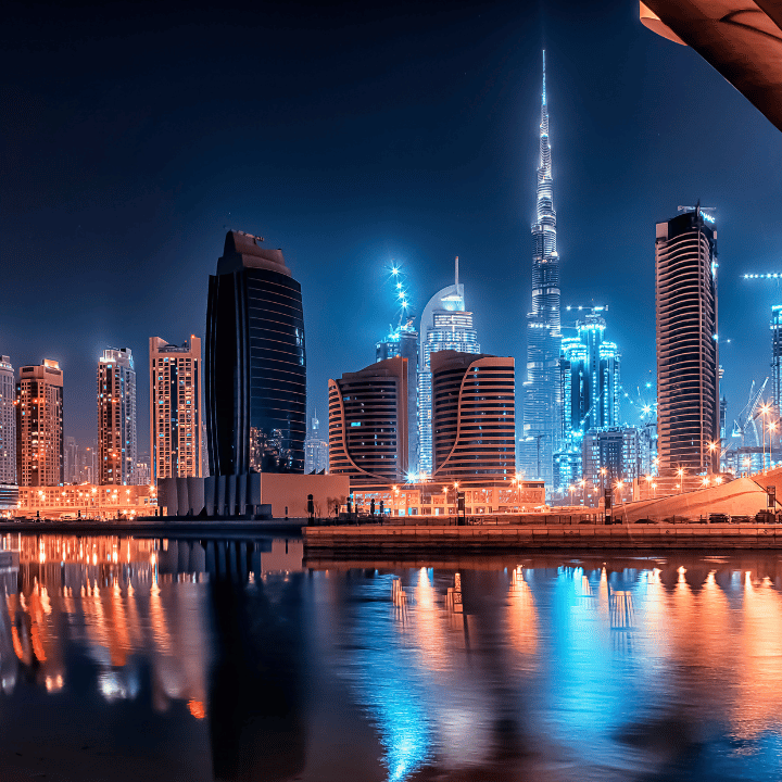 Dubai Marina skyline at night, reflecting the vibrant career landscape for high-performing professionals seeking executive coaching in the UAE.