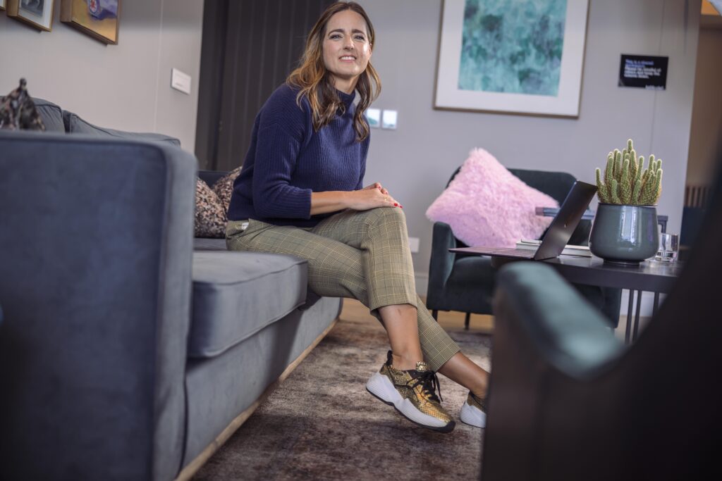 Dr Kerstin Brehm - Global Career Coach - Global Leadership Coach for Women - Sitting on couch